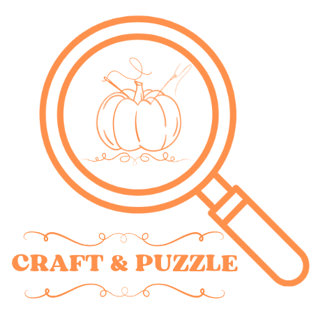 Craft & Puzzle logo - magnifying glass with pumpkin, needle and thread